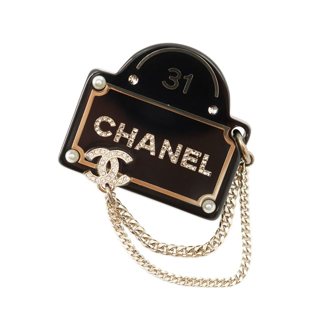 CHANEL Black Logo Brooch